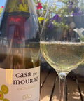 Casa De Mouraz Encruzado 2022 bottle and glass - Natural Wine Dealers