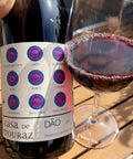 Casa de Mouraz Dao Tinto 2021 bottle and glass - Natural Wine Dealers