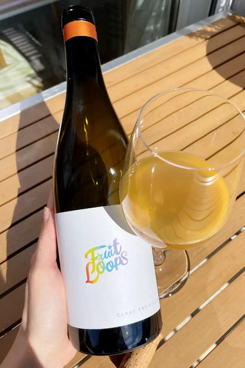 Claus Preisinger Fruit Loops White 2022 bottle and glass - Natural Wine Dealers 