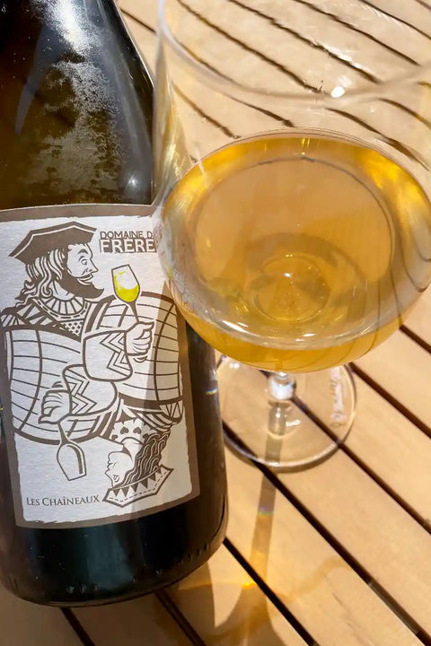 Domaine des Freres Les Chineaux 2021 bottle and glass - Natural Wine Dealers