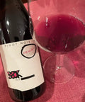 Judith Beck Pinot Noir Bambule 2022 bottle and glass - Natural Wine Dealers