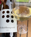 Weninger Fehérburgundi 2022 bottle  and glass - Natural Wine Dealers